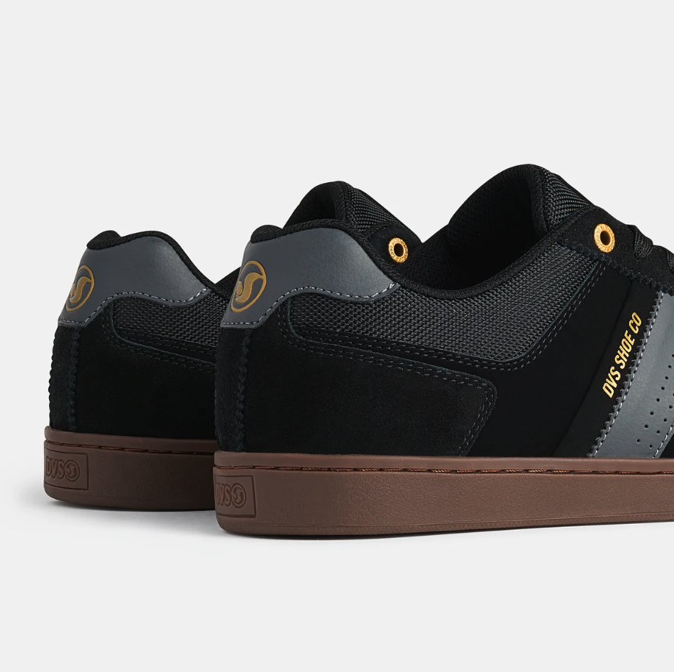 DVS_Milan_St_Black_Black_Gum_side_heel.png